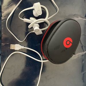 Powerbeats wireless headphones. White.